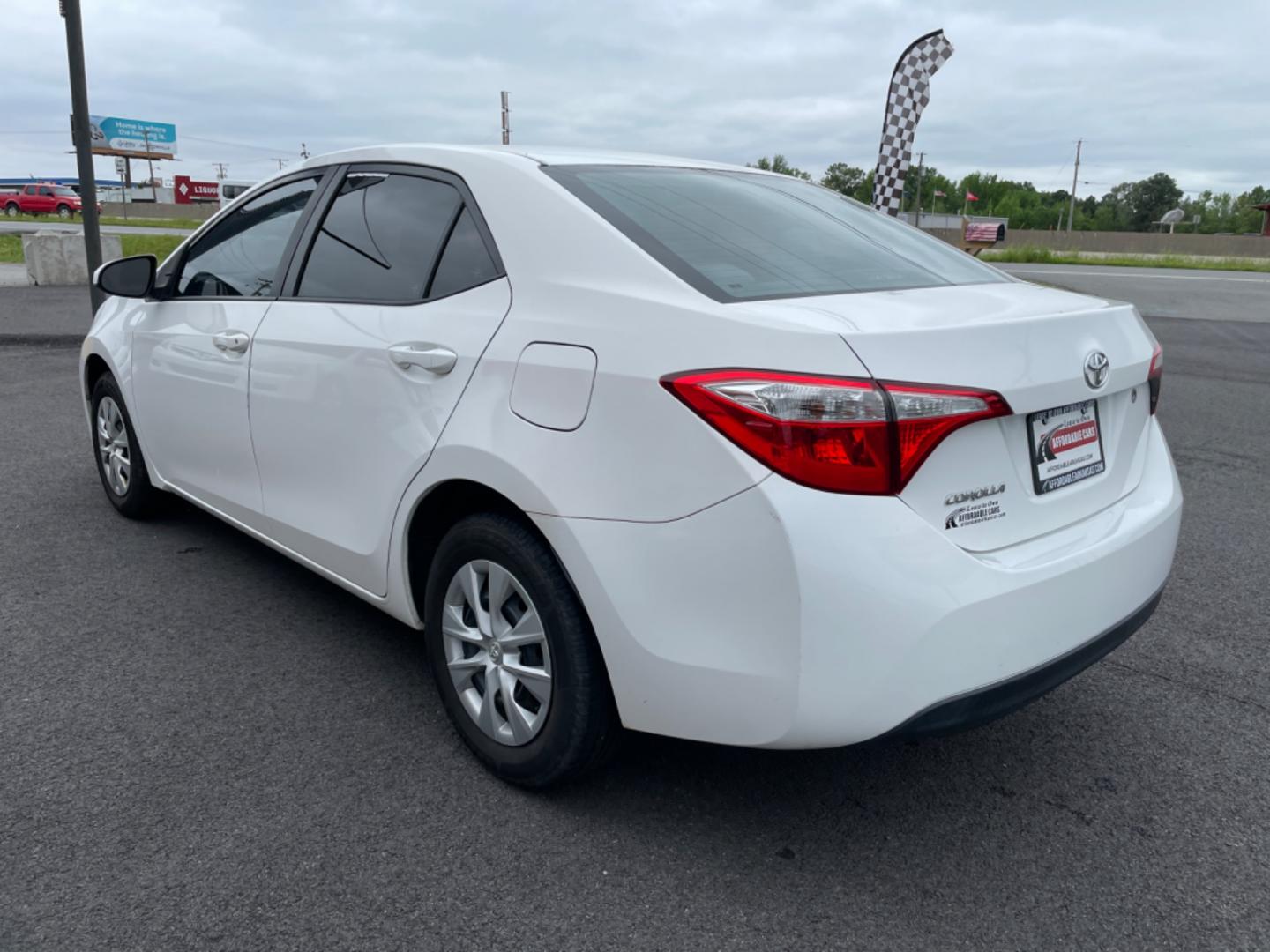 2016 White Toyota Corolla (5YFBURHE8GP) with an 4-Cyl, 1.8 Liter engine, Automatic, CVTi-S transmission, located at 8008 Warden Rd, Sherwood, AR, 72120, (501) 801-6100, 34.830078, -92.186684 - Photo#5